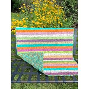 Connecting Threads Toddler Quilt with Batik Back